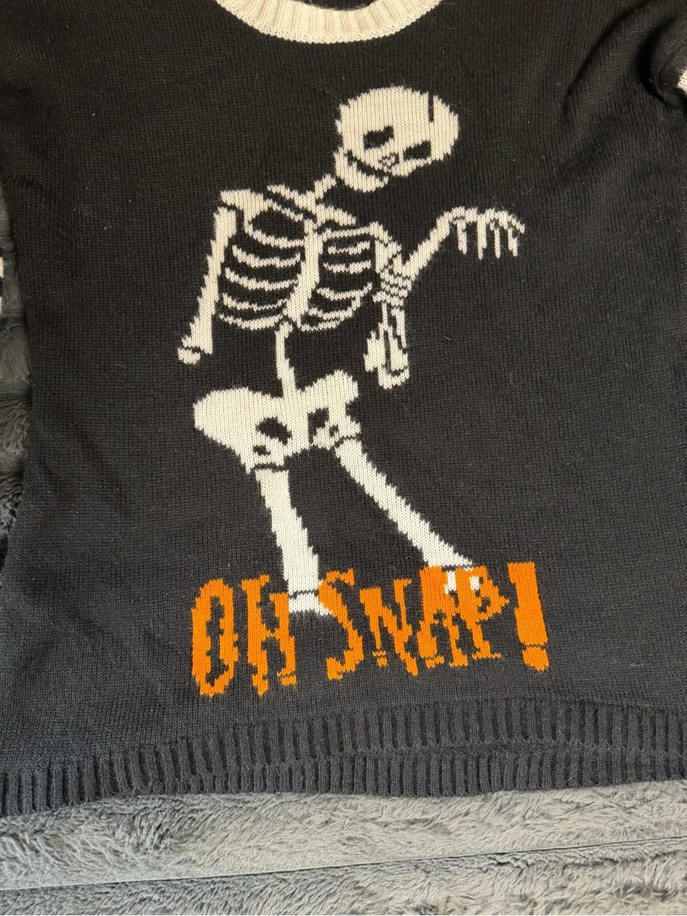 Black & White Skeletal Graphic Crewneck Sweater with Orange Accent